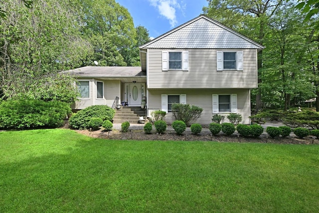 17 E Stemmer Ln, Suffern, NY 10901 - split level home featuring a front lawn
