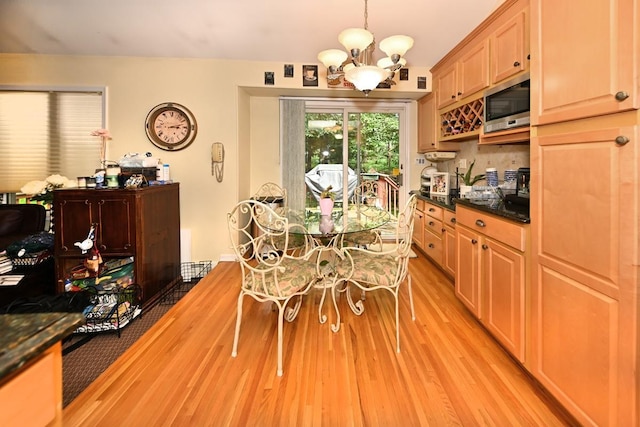 17 E Stemmer Ln, Suffern, NY 10901 - dining space with a chandelier and light wood-style floors