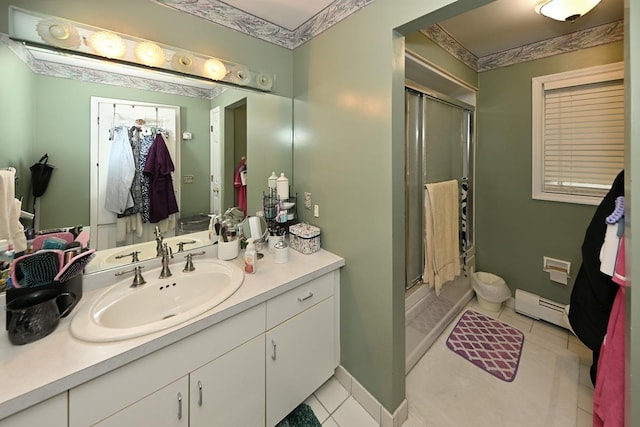 17 E Stemmer Ln, Suffern, NY 10901 - full bath with baseboard heating, tile patterned flooring, vanity, and a stall shower