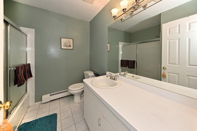 17 E Stemmer Ln, Suffern, NY 10901 - full bath with a baseboard radiator, tile patterned flooring, vanity, and shower / bath combination with glass door