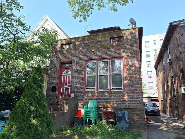 392 E 7th St, Brooklyn, NY 11218 - view of front of home featuring brick siding and entry steps