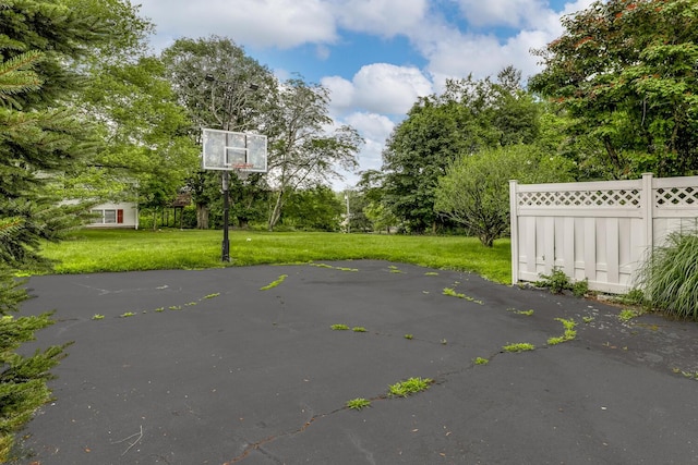 28 Lime Kiln Rd, Suffern, NY 10901 - view of basketball court with basketball hoop and view of scattered trees