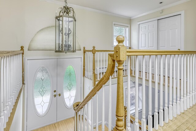 28 Lime Kiln Rd, Suffern, NY 10901 - foyer entrance with a chandelier, wood finished floors, ornamental molding, and french doors