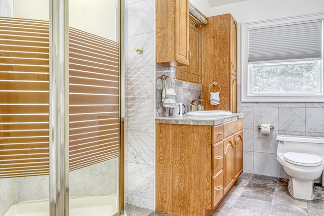 28 Lime Kiln Rd, Suffern, NY 10901 - bathroom featuring vanity, tile walls, and a stall shower