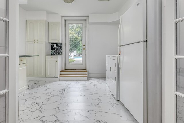 28 Lime Kiln Rd, Suffern, NY 10901 - laundry area featuring light marble finish floors and washer / clothes dryer