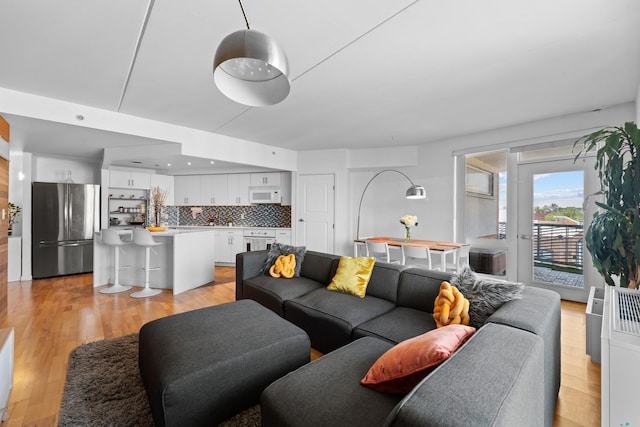 853 Macy Pl Unit 5G, Bronx, NY 10455 - living room with light wood finished floors