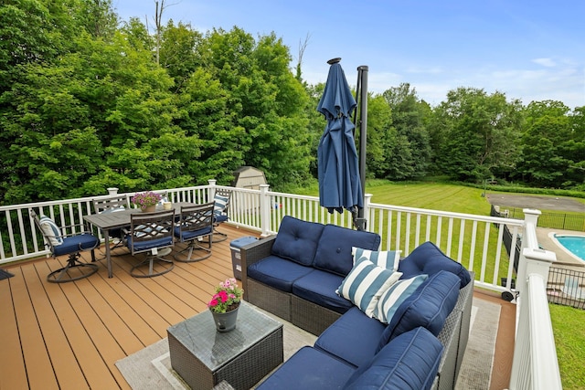 125 Whipple Rd, Middletown, NY 10940 - wooden terrace featuring an outdoor living space, outdoor dining space, a shed, and a yard