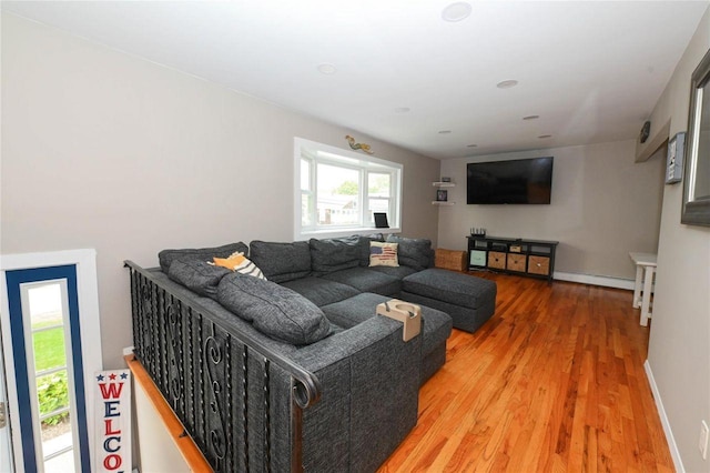 184 Sumpwams Ave, Babylon, NY 11702 - living area with light wood-type flooring and baseboards
