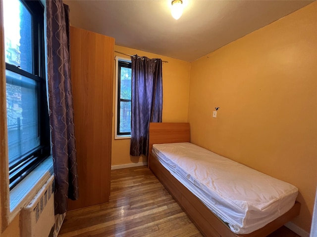 150-15 72nd Rd Unit 1A, Kew Garden Hills, NY 11367 - bedroom with hardwood / wood-style flooring and baseboards