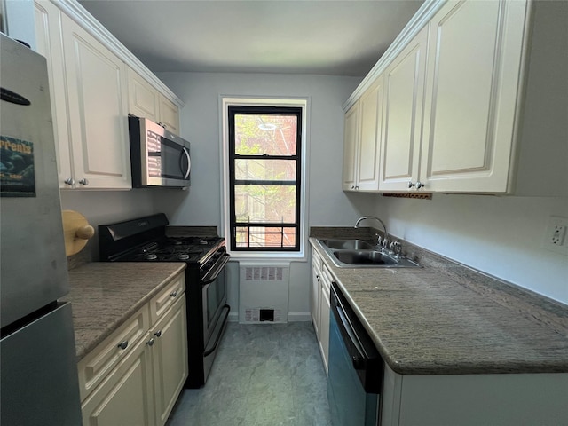 150-15 72nd Rd Unit 1A, Kew Garden Hills, NY 11367 - kitchen with black appliances, radiator heating unit, and white cabinetry