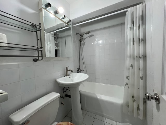 150-15 72nd Rd Unit 1A, Kew Garden Hills, NY 11367 - full bathroom with shower / bathtub combination with curtain, tile walls, tile patterned flooring, and decorative backsplash