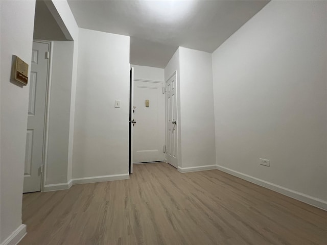 150-15 72nd Rd Unit 1A, Kew Garden Hills, NY 11367 - empty room featuring light wood finished floors and baseboards