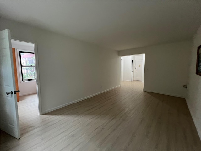 150-15 72nd Rd Unit 1A, Kew Garden Hills, NY 11367 - empty room with light wood-style floors