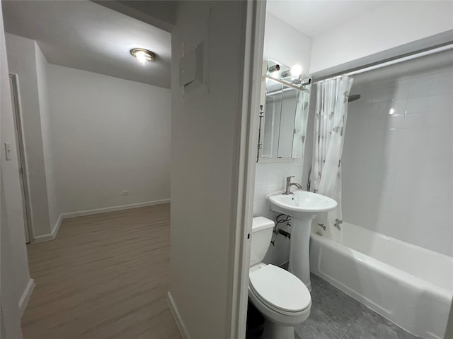 150-15 72nd Rd Unit 1A, Kew Garden Hills, NY 11367 - bathroom featuring shower / bath combo and wood finished floors