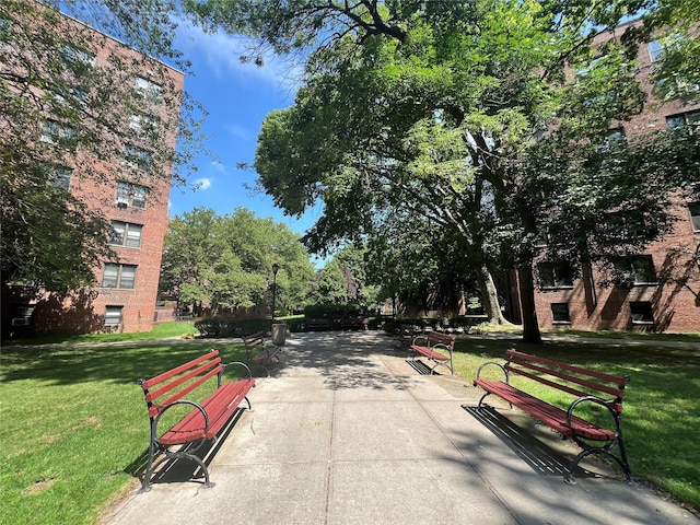 150-15 72nd Rd Unit 1A, Kew Garden Hills, NY 11367 - surrounding community featuring a lawn