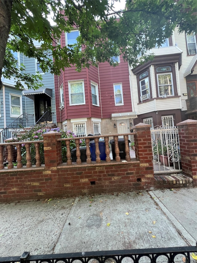 1205 Hancock St, Brooklyn, NY 11221 - townhome / multi-family property with a fenced front yard