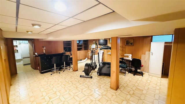 64 Meadowfarm Rd, Manhasset Hills, NY 11040 - workout area featuring wood walls and a drop ceiling