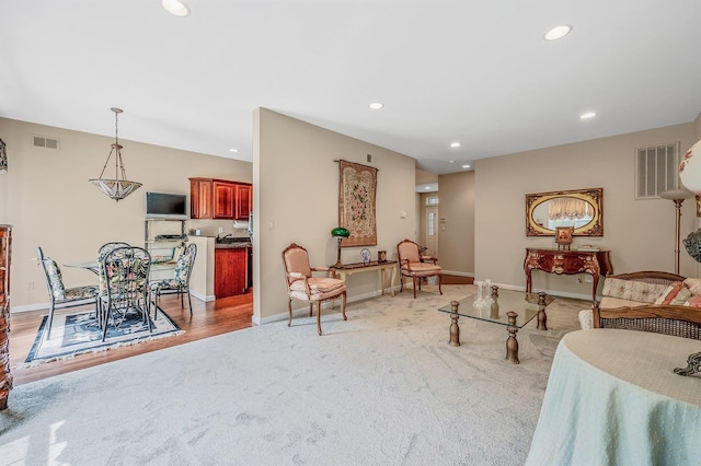 52 Mantack Path, Kings Park, NY 11754 - living area with light carpet and recessed lighting