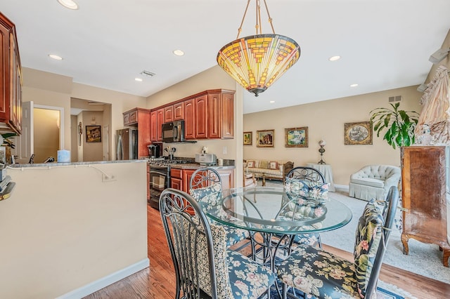 52 Mantack Path, Kings Park, NY 11754 - dining room featuring light wood-style flooring, recessed lighting, and a chandelier