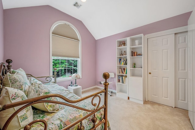 52 Mantack Path, Kings Park, NY 11754 - bedroom featuring lofted ceiling, light colored carpet, and a closet