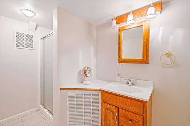 52 Mantack Path, Kings Park, NY 11754 - full bath with tile patterned floors, a shower stall, and vanity