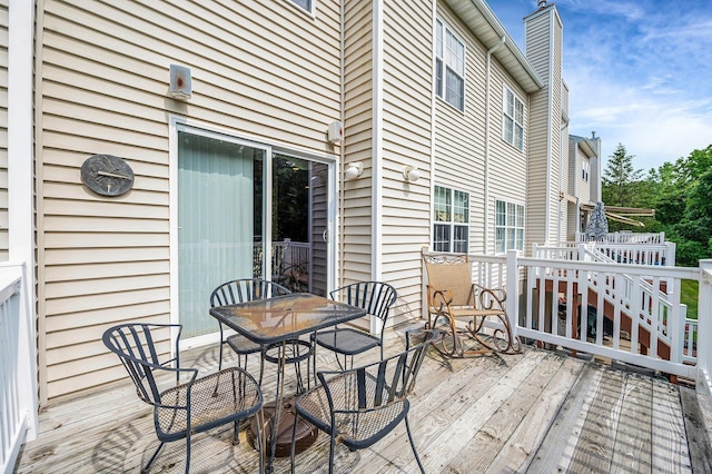 52 Mantack Path, Kings Park, NY 11754 - wooden terrace with outdoor dining space