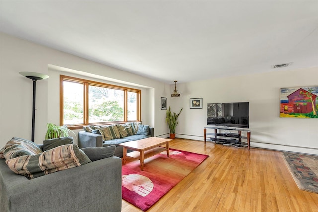 9 Bittersweet Ln, Glen Cove, NY 11542 - living room featuring wood finished floors