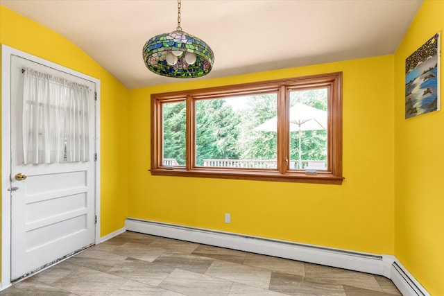 9 Bittersweet Ln, Glen Cove, NY 11542 - spare room featuring baseboard heating and vaulted ceiling