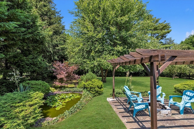 9 Bittersweet Ln, Glen Cove, NY 11542 - view of grassy yard featuring a pergola and a fire pit