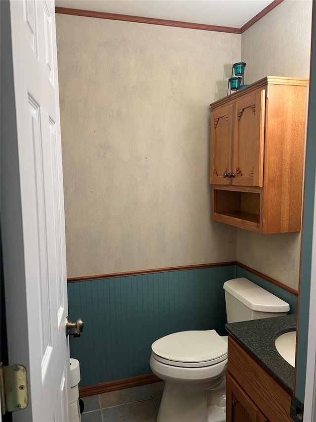 13 Butternut Ct, Highland Mills, NY 10930 - half bathroom with vanity, tile patterned floors, ornamental molding, and a wainscoted wall