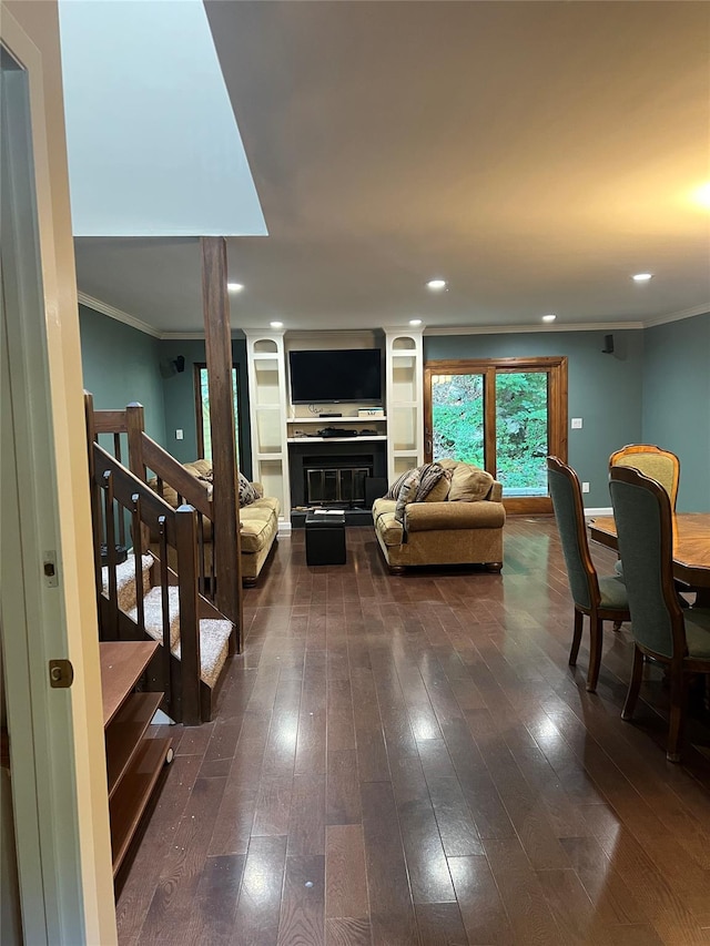 13 Butternut Ct, Highland Mills, NY 10930 - living room featuring crown molding, dark wood-style flooring, stairs, recessed lighting, and a glass covered fireplace
