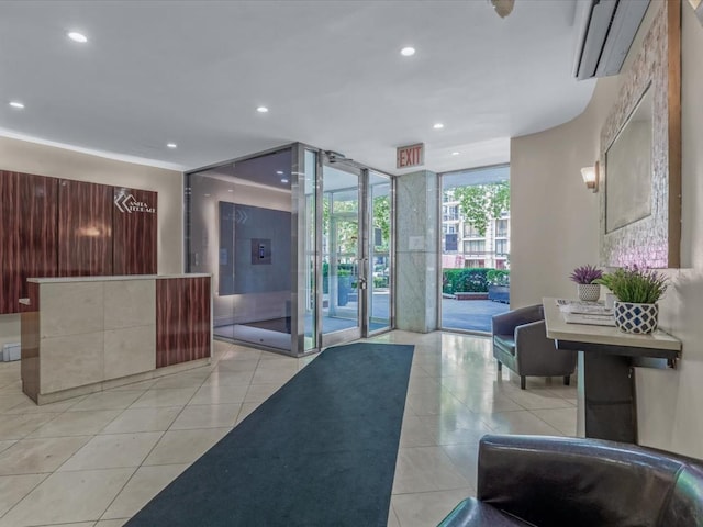 99-05 63rd Dr Unit 7R, Rego Park, NY 11374 - lobby with expansive windows and recessed lighting