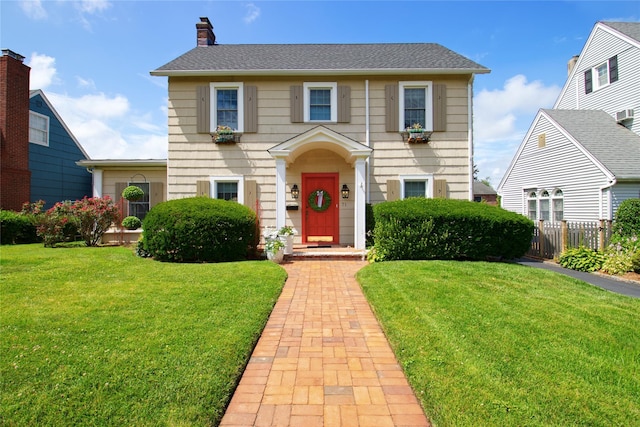 71 Hillcrest Ave, Manhasset, NY 11030 - colonial home featuring a chimney