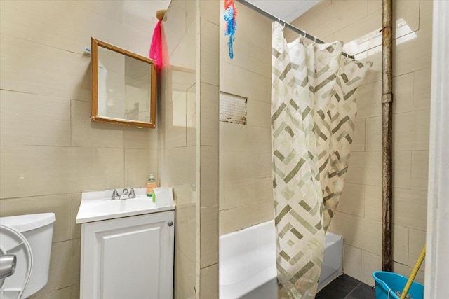 1047 Trinity Ave, Bronx, NY 10456 - full bathroom with shower / bathtub combination with curtain, tile walls, and vanity