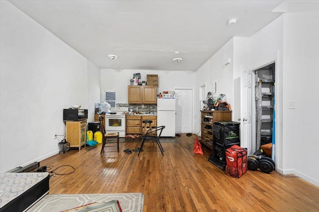 1047 Trinity Ave, Bronx, NY 10456 - office area with wood-type flooring and baseboards