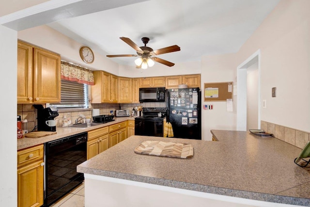 1455 Kennellworth Pl, Bronx, NY 10465 - kitchen featuring black appliances, backsplash, a peninsula, and a ceiling fan