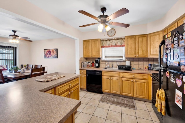 1455 Kennellworth Pl, Bronx, NY 10465 - kitchen featuring black appliances, ceiling fan, tasteful backsplash, light tile patterned flooring, and light countertops