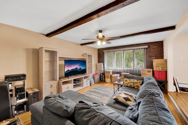 1455 Kennellworth Pl, Bronx, NY 10465 - living area featuring light wood-style flooring, beamed ceiling, and a ceiling fan