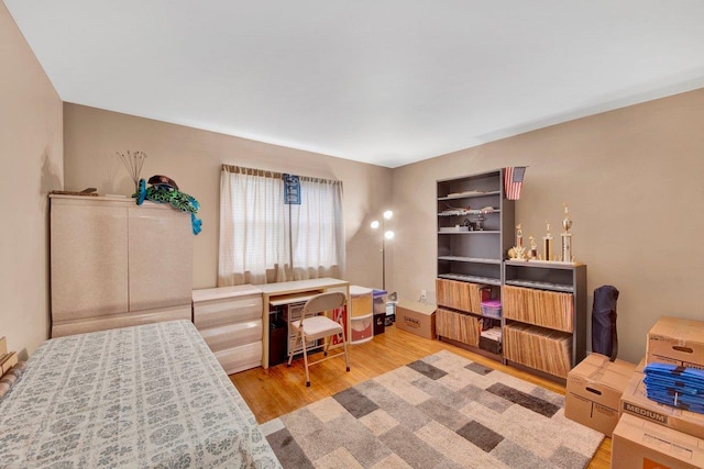 1455 Kennellworth Pl, Bronx, NY 10465 - bedroom with wood finished floors and a desk