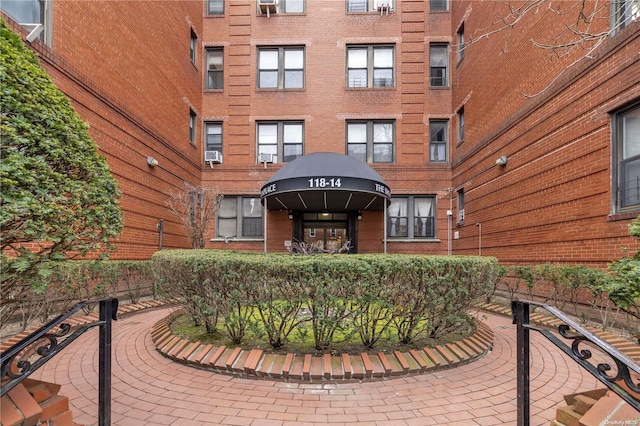 118-14 83rd Ave Unit 2E, Kew Gardens, NY 11415 - view of building exterior with cooling unit