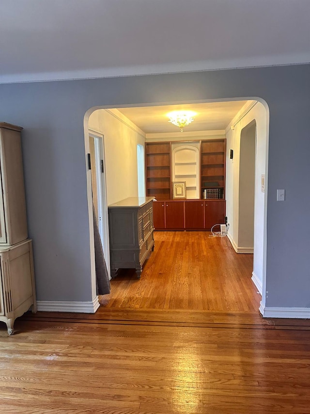 118-14 83rd Ave Unit 2E, Kew Gardens, NY 11415 - hall featuring arched walkways and wood finished floors
