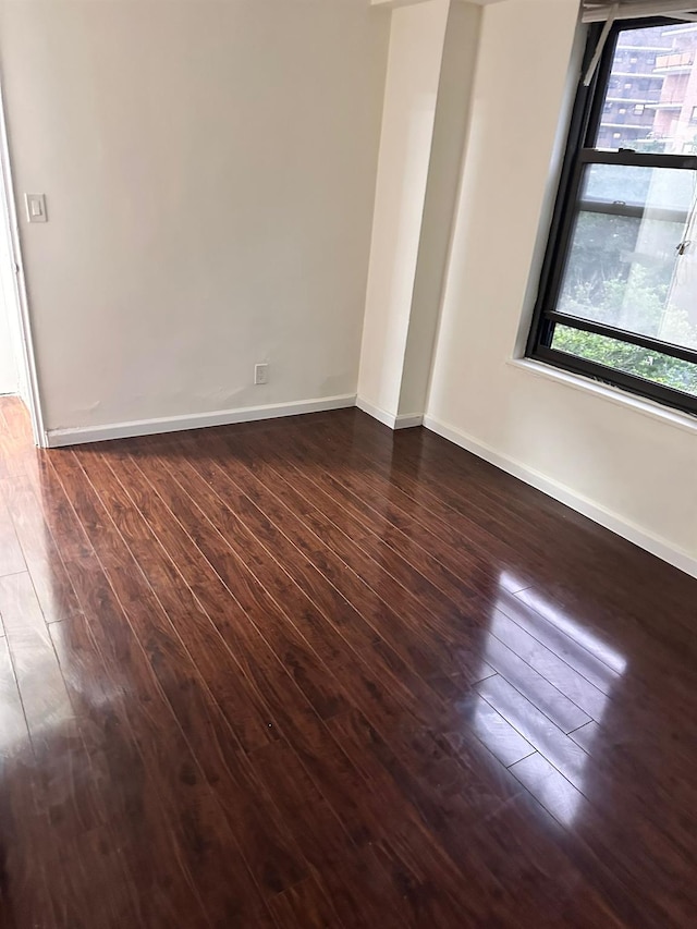 6145 98th St Unit 5J, Rego Park, NY 11374 - unfurnished room featuring dark wood finished floors
