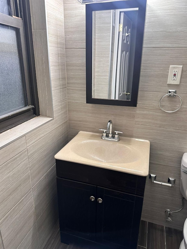 6145 98th St Unit 5J, Rego Park, NY 11374 - bathroom featuring vanity and tile walls