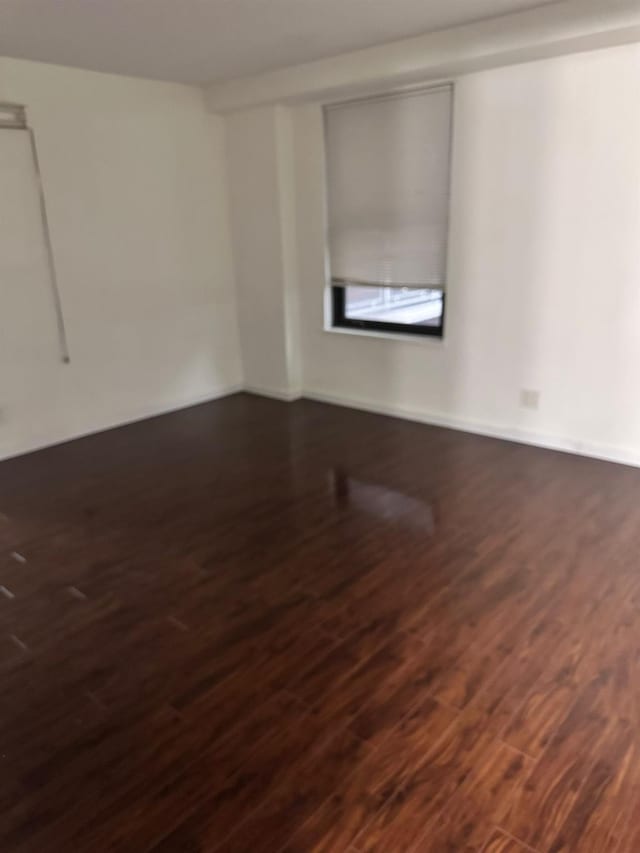 6145 98th St Unit 5J, Rego Park, NY 11374 - unfurnished room featuring dark wood-type flooring
