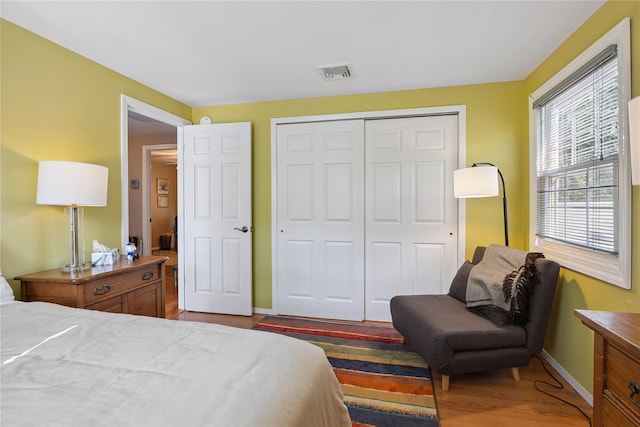 15 Shadetree Ln, Stony Brook, NY 11790 - bedroom featuring a closet and wood finished floors
