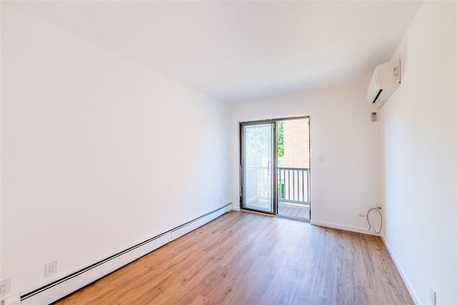 3-06 121st St, College Point, NY 11356 - empty room with a baseboard heating unit, a wall mounted AC, and light wood-style flooring