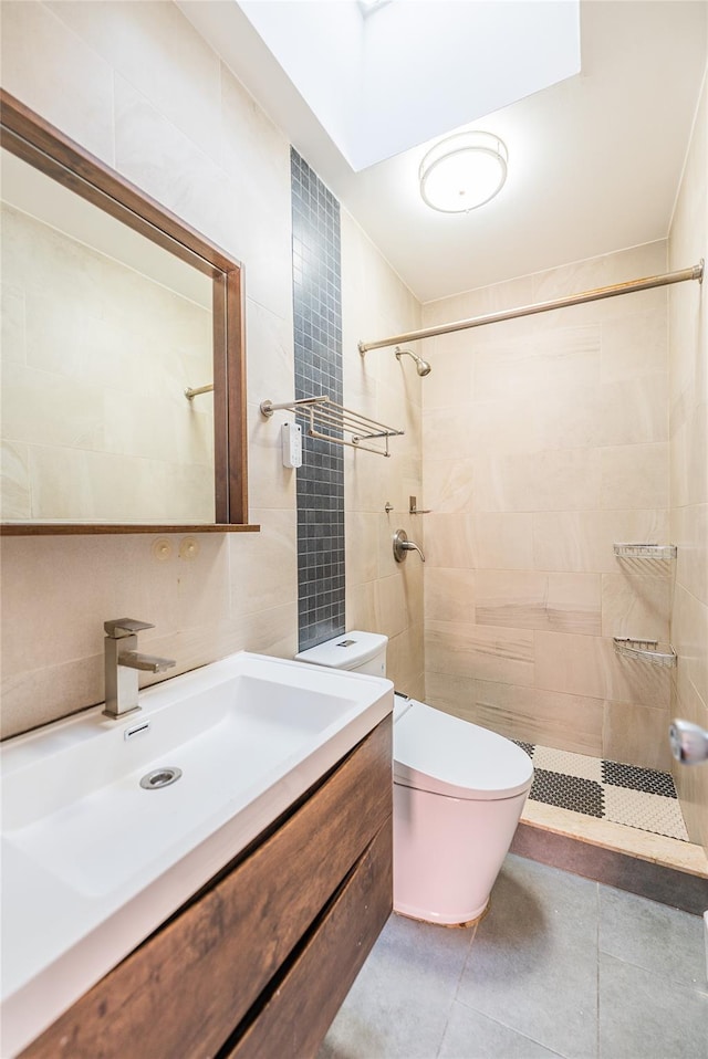 3-06 121st St, College Point, NY 11356 - bathroom with vanity, a tile shower, tile patterned flooring, and tile walls