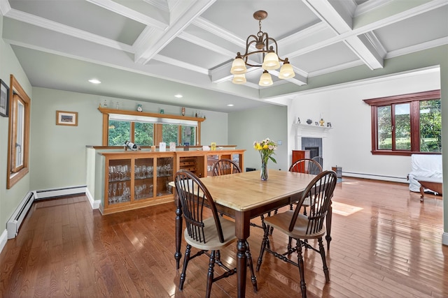 53 Mountain View Dr, Holmes, NY 12531 - dining area featuring a chandelier, coffered ceiling, crown molding, baseboard heating, and a tile fireplace