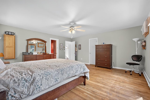 53 Mountain View Dr, Holmes, NY 12531 - bedroom with light wood finished floors, ceiling fan, and baseboard heating