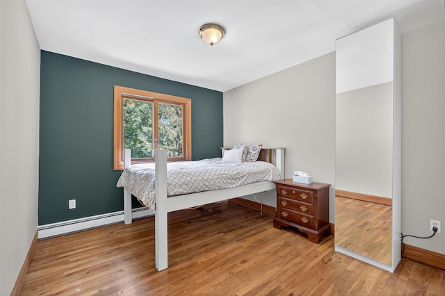 53 Mountain View Dr, Holmes, NY 12531 - bedroom featuring light wood finished floors and baseboard heating